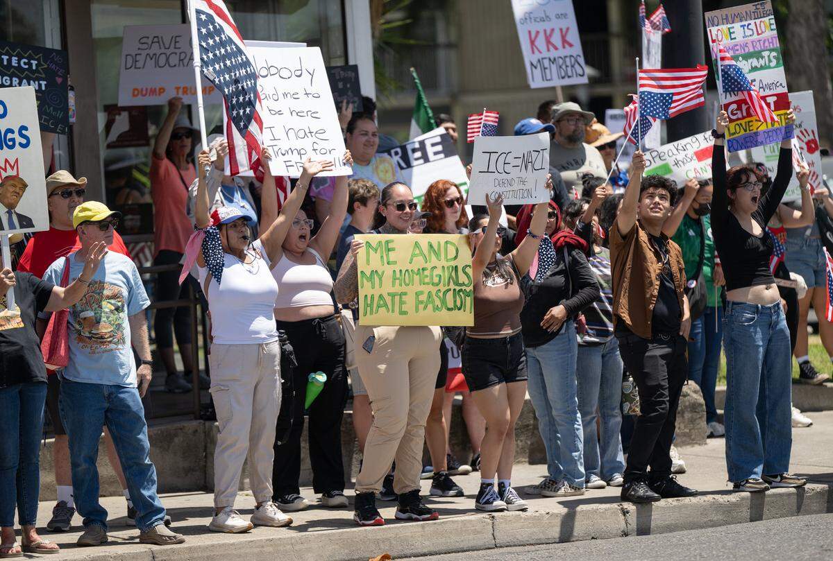 “No Kings” protestors rallied at Five Points to oppose Trump Administration policies at Graceada Park in Modesto, Saturday, June 14, 2025.
