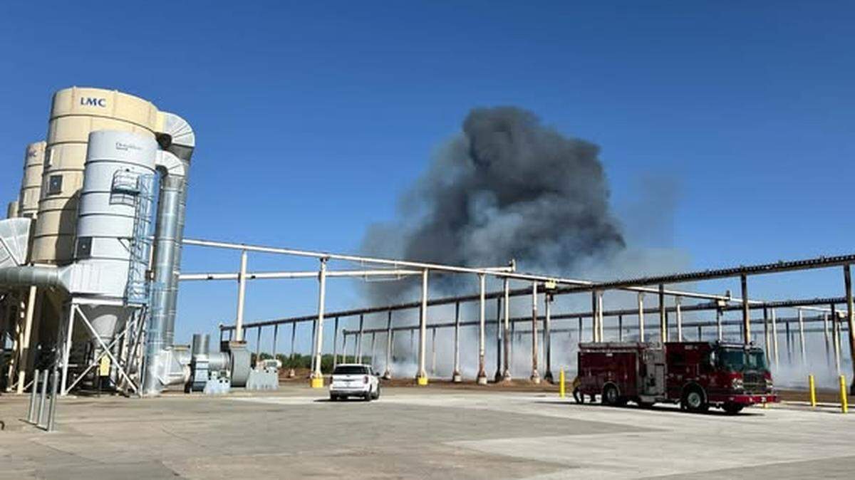 Smoke from a tire fire ignited by an adjacent burning almond hull fire billows black smoke seen for miles on Sunday, May 17, 2026.