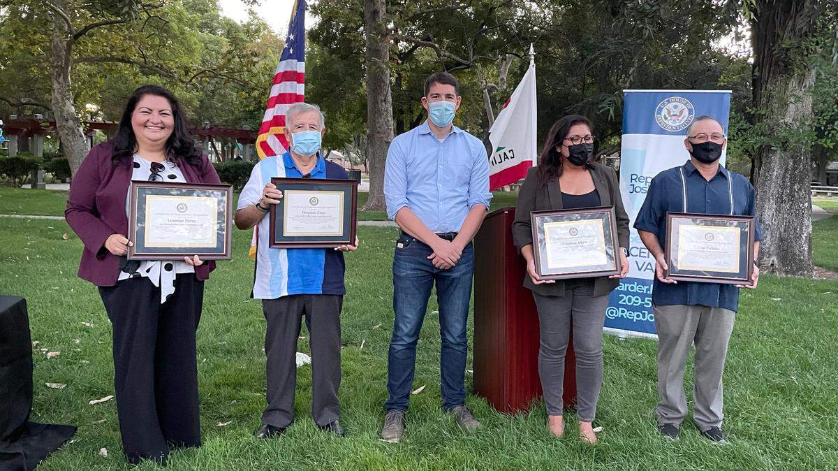 Rep. Josh Harder, center, presented his Latino Leadership Award to, from left, Lourdes Perez, Dionicio (Danny) Cruz, Carolina Alfaro and Noe Paramo on Sept. 9, 2021 in Modesto CA.