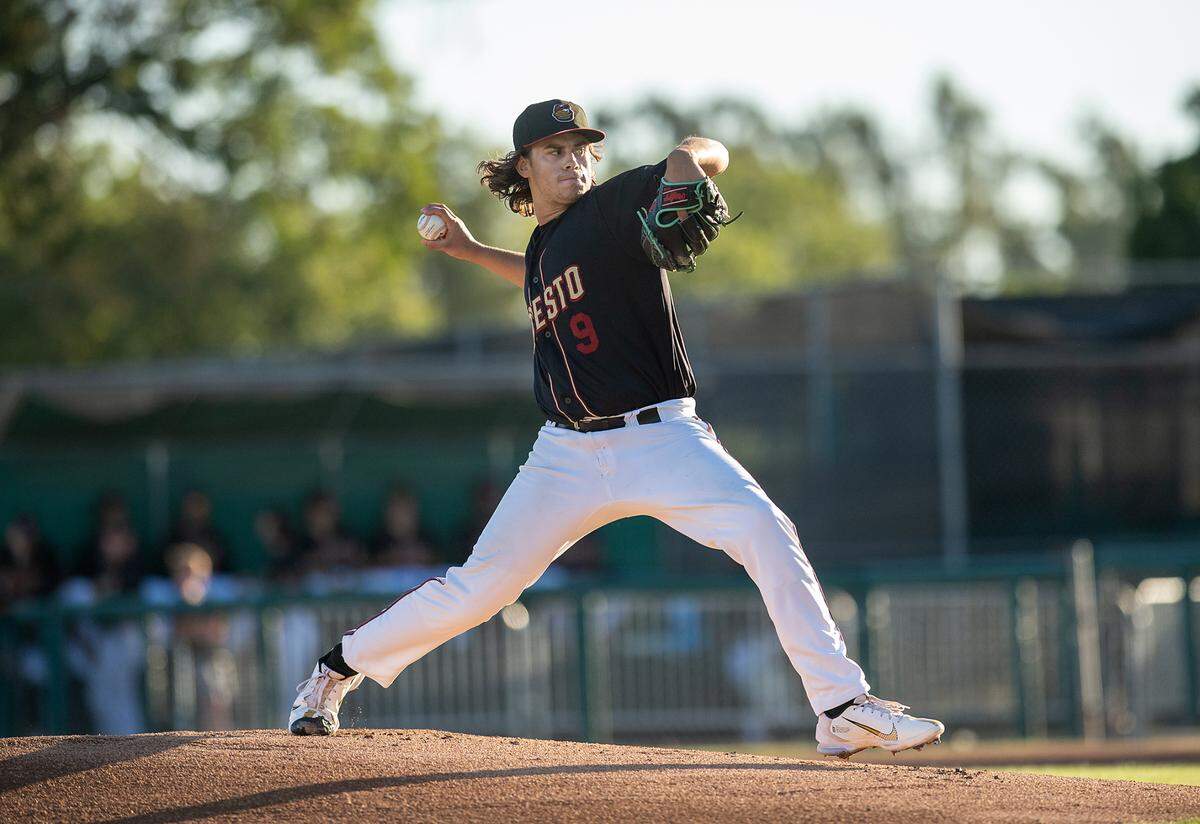 Modesto Nuts starting pitcher Michael Morales delivers a pitch during the California League game with the Stockton Ports at John Thurman Field in Modesto, Calif., on Wednesday, July 6, 2022.