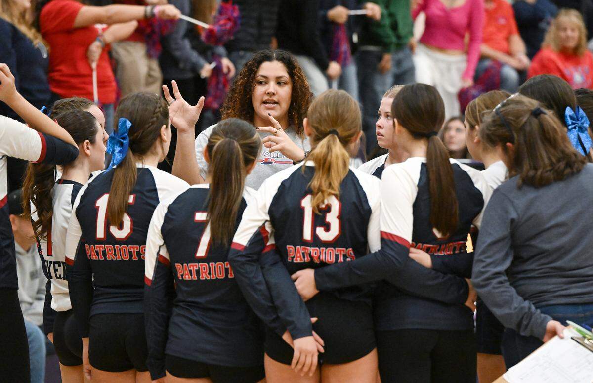 Beyer coach Sara Gonzalez talks with her players on a time out during the D-III quarterfinal playoff match at Escalon High School in Escalon, Calif., Thursday, Oct. 26, 2023.