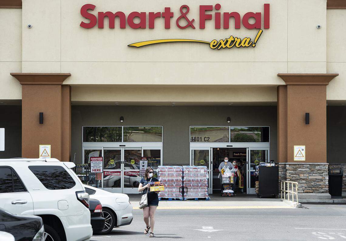 Shoppers and employees are now required to wear a face covering at Smart & Final store in Modesto, Calif., on Wednesday, April 29, 2020.