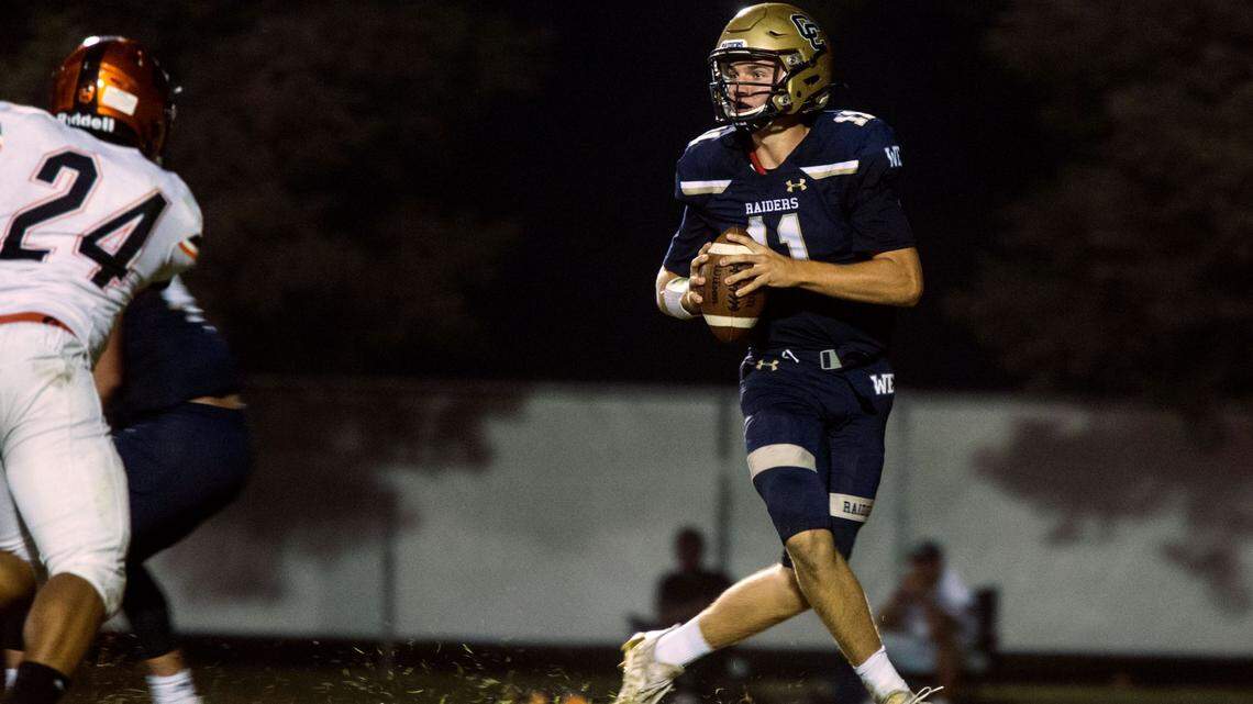 Central Catholic’s Tyler Wentworth looks upfield for an open man during the Raiders’ game against Merced on Friday, Aug. 20, 2021.