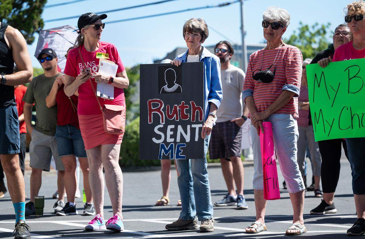 Mary Ann Reynolds, middle, and hundreds of others brought signs and enthusiasm in support of abortion rights during a rally at Planned Parenthood on McHenry Avenue in Modesto, Calif., on Saturday, May 14, 2022.