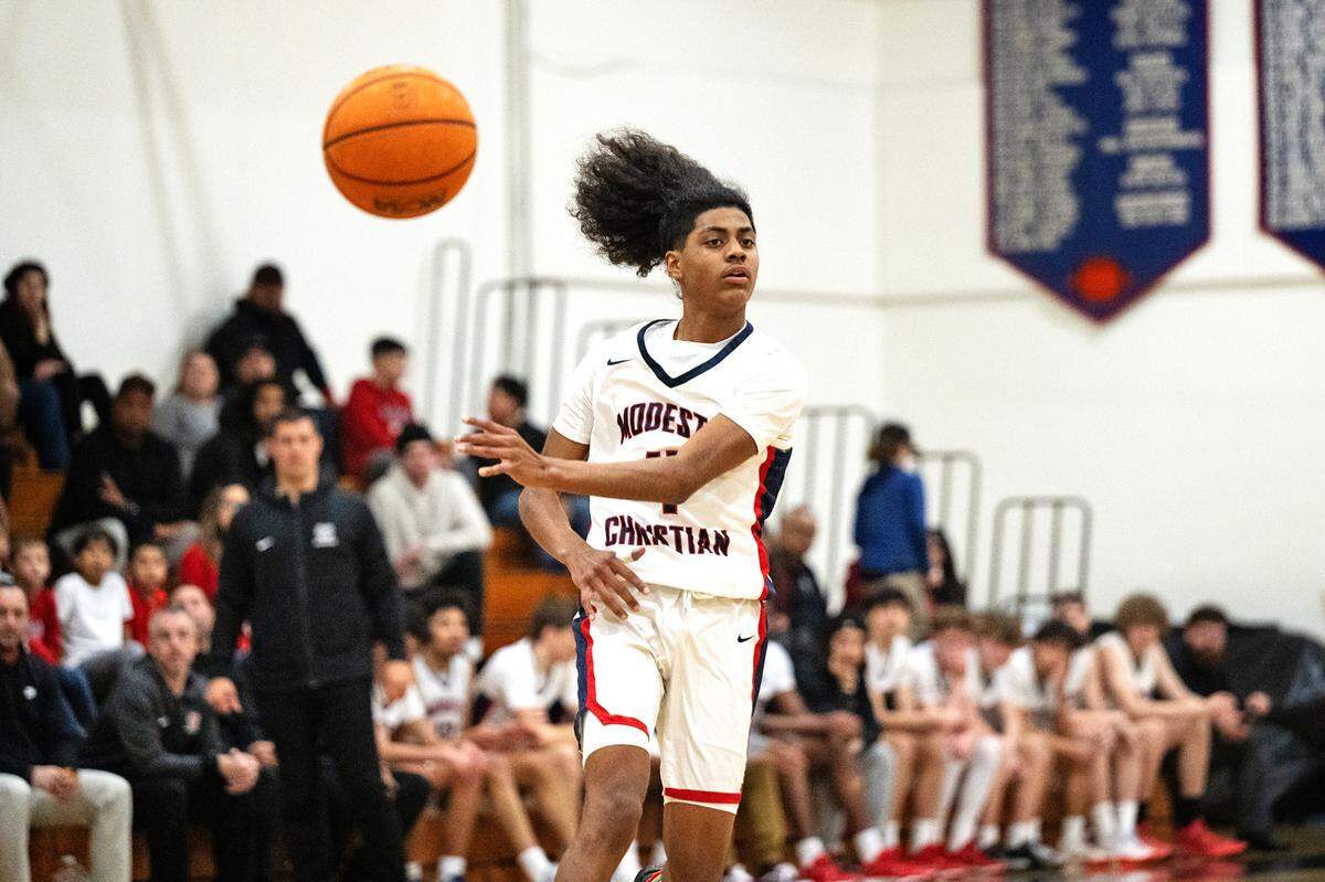 Modesto Christian’s Ross Widemon makes a pass during the Sac-Joaquin Section Division I playoff game with Cosumnes Oaks at Modesto Christian High School in Salida, Calif., Wednesday, Feb. 14, 2024.