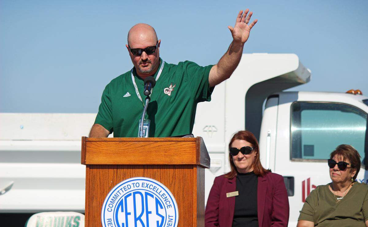 Central Valley High School athletic director Greg Magni speaks during the June 9 ceremony about the school building a stadium.