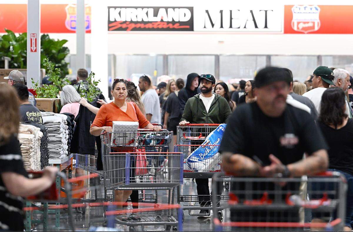 Costco members shop on the first day of operation at the warehouse store in Riverbank, Calif., Thursday, June 13, 2024.