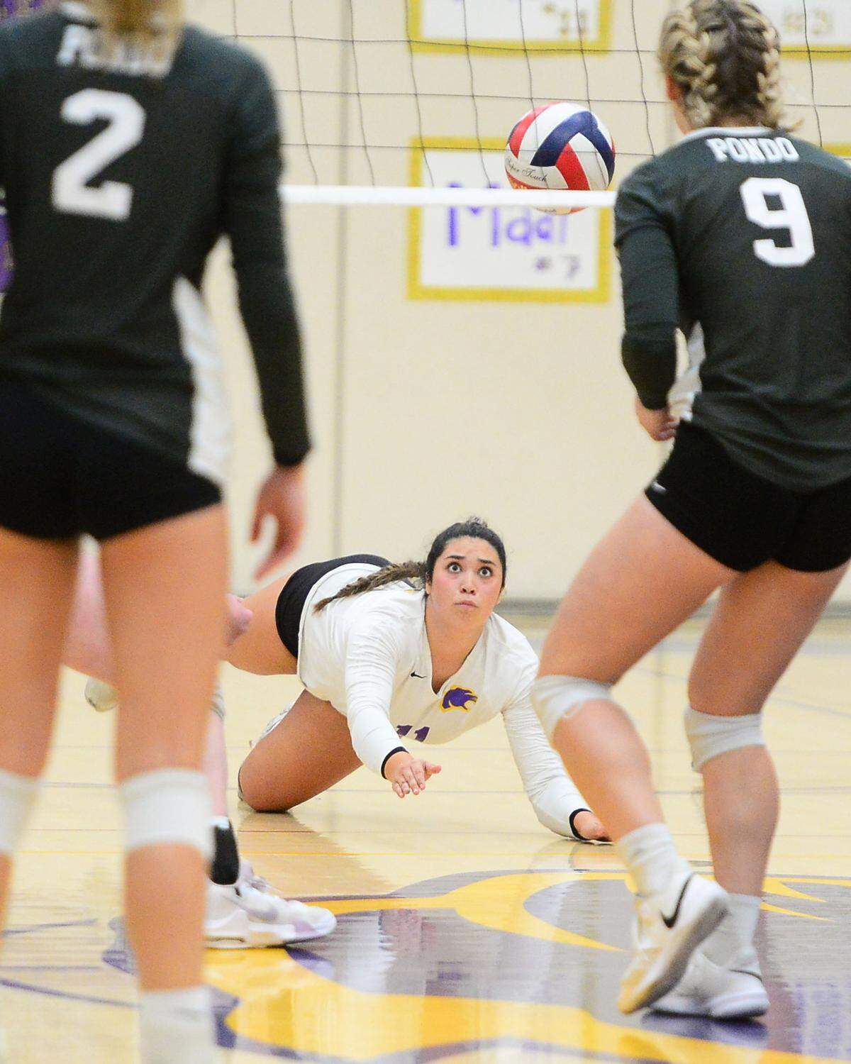 Escalon’s Karisa McNeil (1) dives foward to dig a ball during a CIF San-Joaquin Division III Girls Volleyball Playoffs game between Escalon High School and Ponderosa High School at Escalon High School in Escalon CA on November 1, 2022. Escalon won the match 3-2.