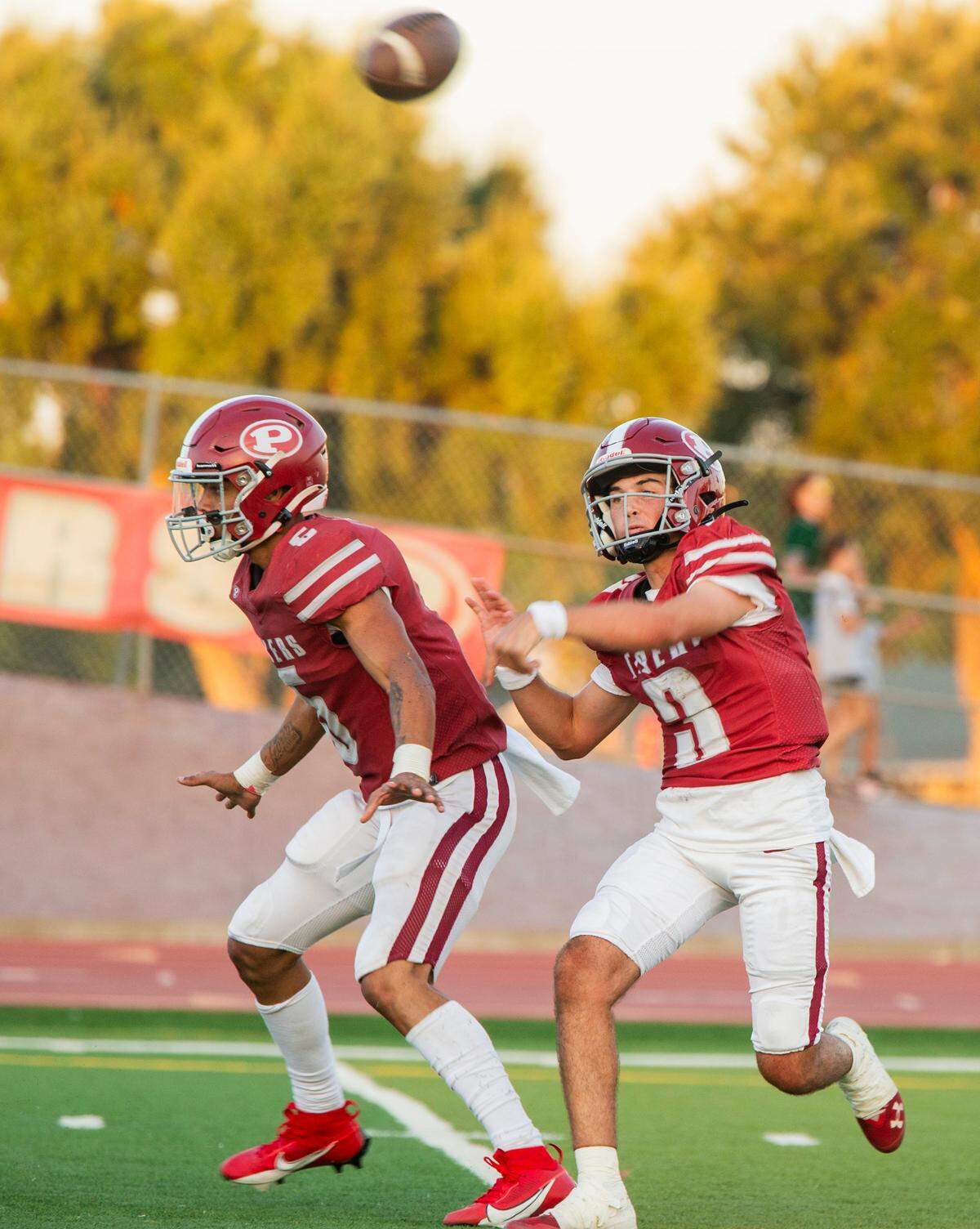Patterson’s Max Medina, 3, throws a pass up field.