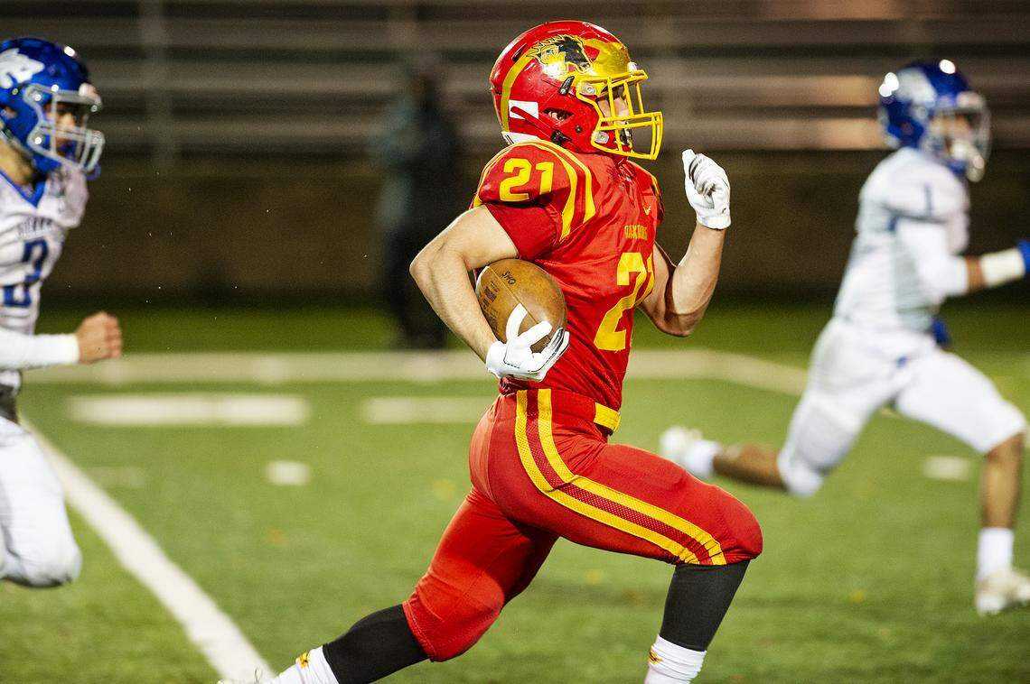 Oakdale’s Leo Ayala breaks free on a touchdown run during the Sac-Joaquin Section Division IV title game with Sierra at Lincoln High School in Stockton, Calif., Saturday, Nov. 30, 2019.