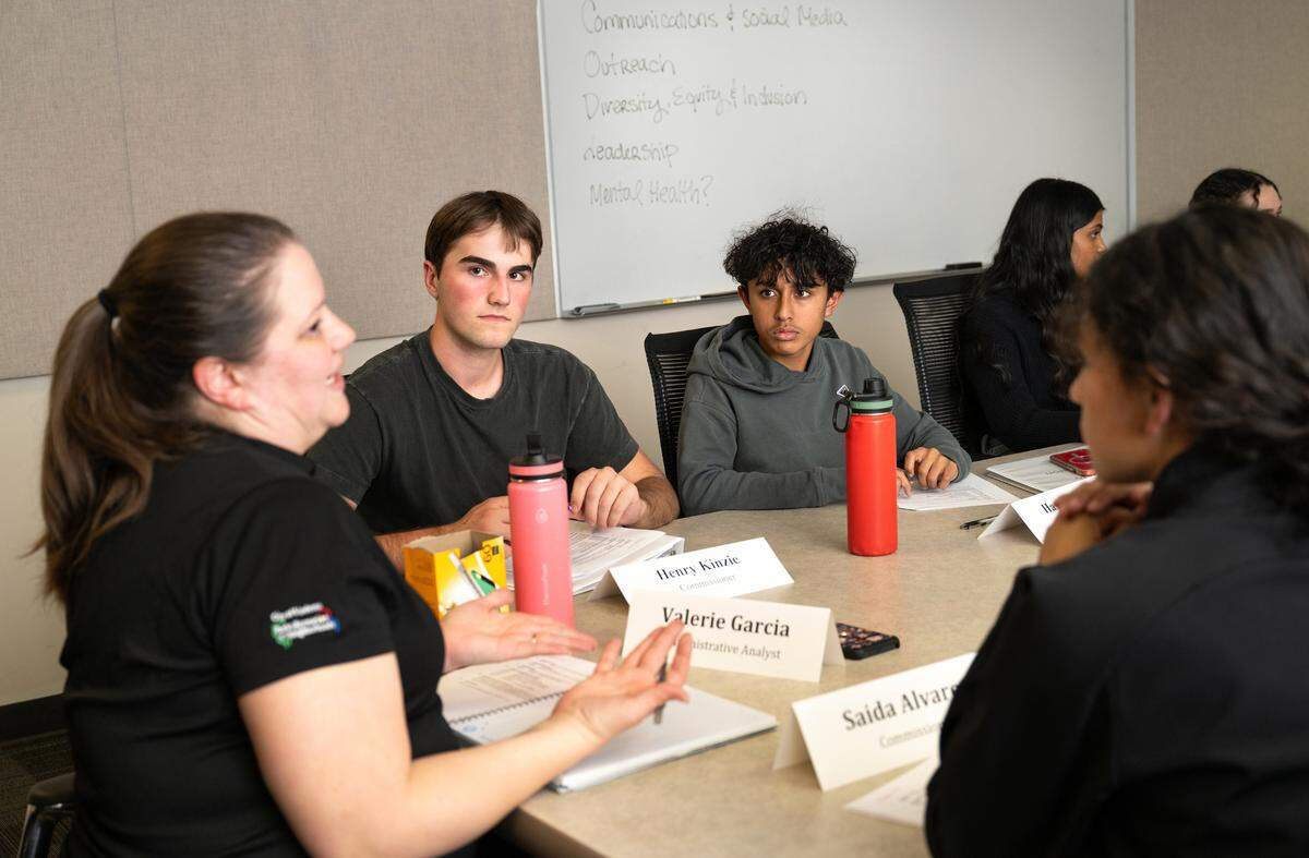 Valerie Garcia, left, facilitates a meeting of the Youth Commission in Modesto on Wednesday, Nov. 13, 2024.