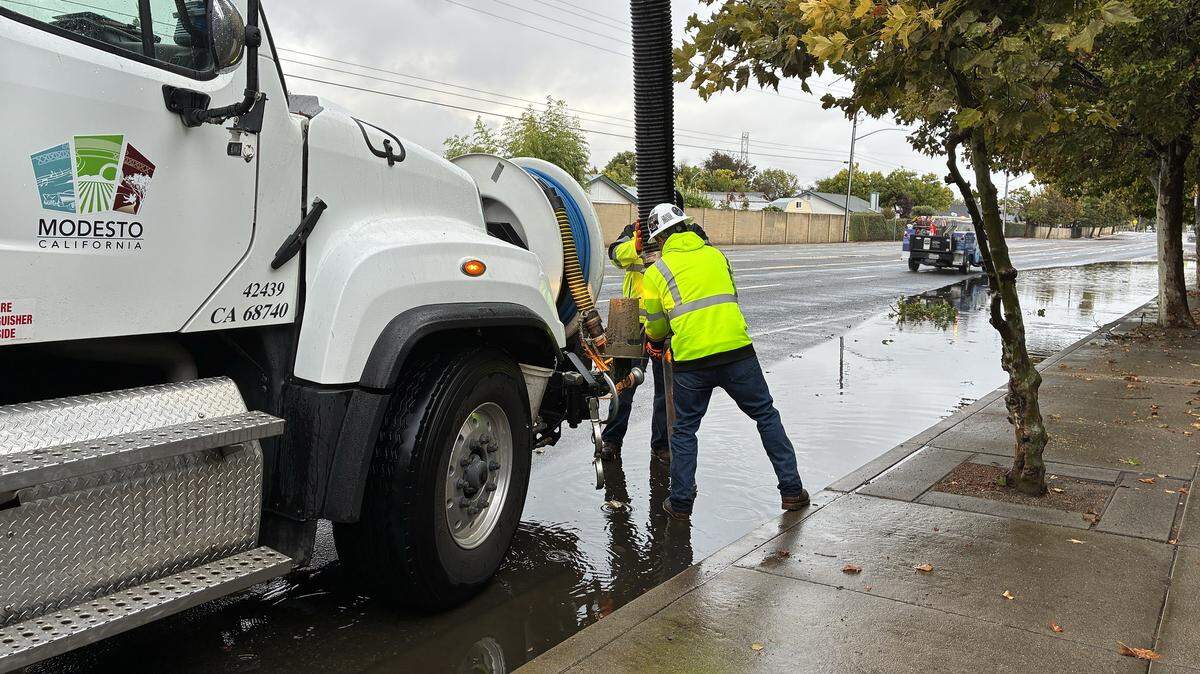 City crews work to unclog a rock well on Pelandale Avenue on Oct. 14, 2025.