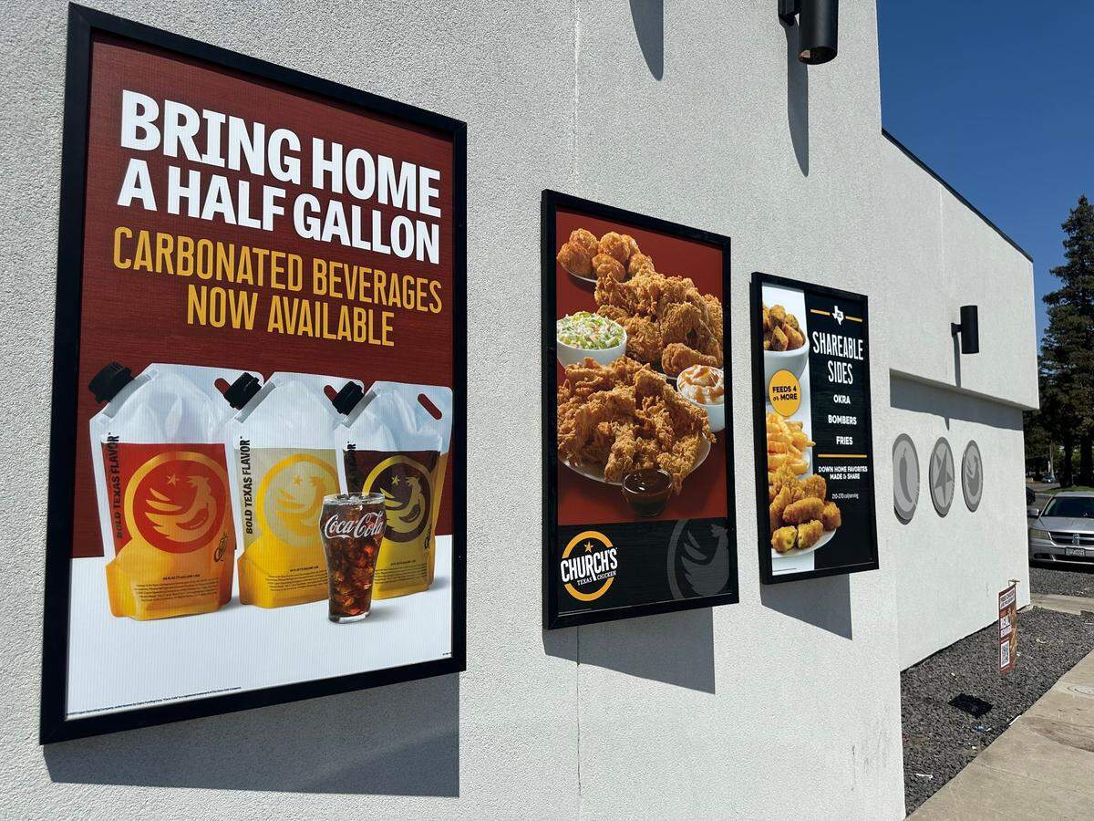 Some of the menu items featured on the side of the Church’s Texas Chicken building at 2020 Standiford Ave. in Modesto, Calif.