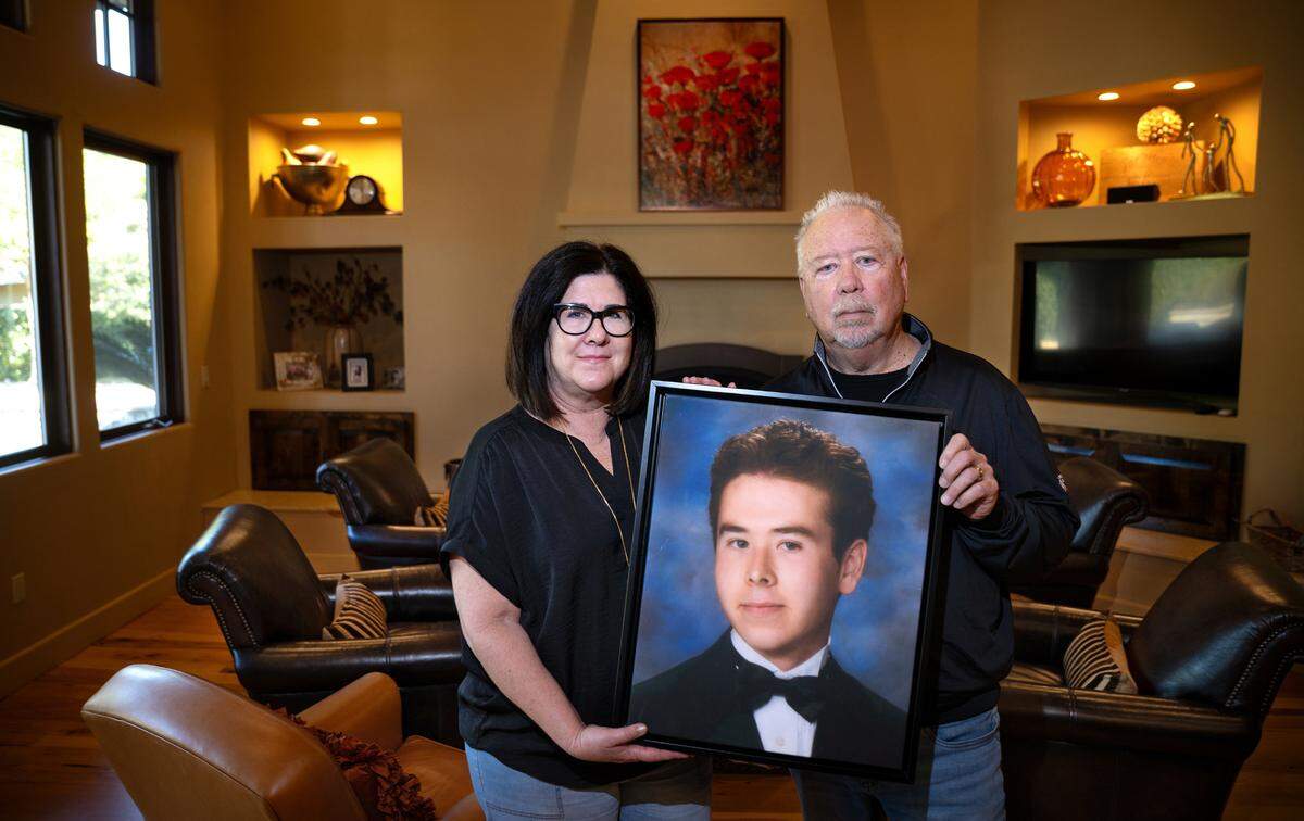 Steve and Kim Roland hold a picture of their son Max, 23, who died of fentanyl poisoning in 2023. Photographed in Ripon on Wednesday, Jan. 15, 2025.