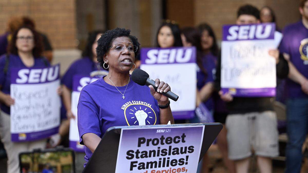 Service Employees International Union Local 521 vice president Renee Crawford speaks during a press conference outside the Stanislaus County offices at 10th Street Place in Modesto, Tuesday, Sept. 16, 2025. 
