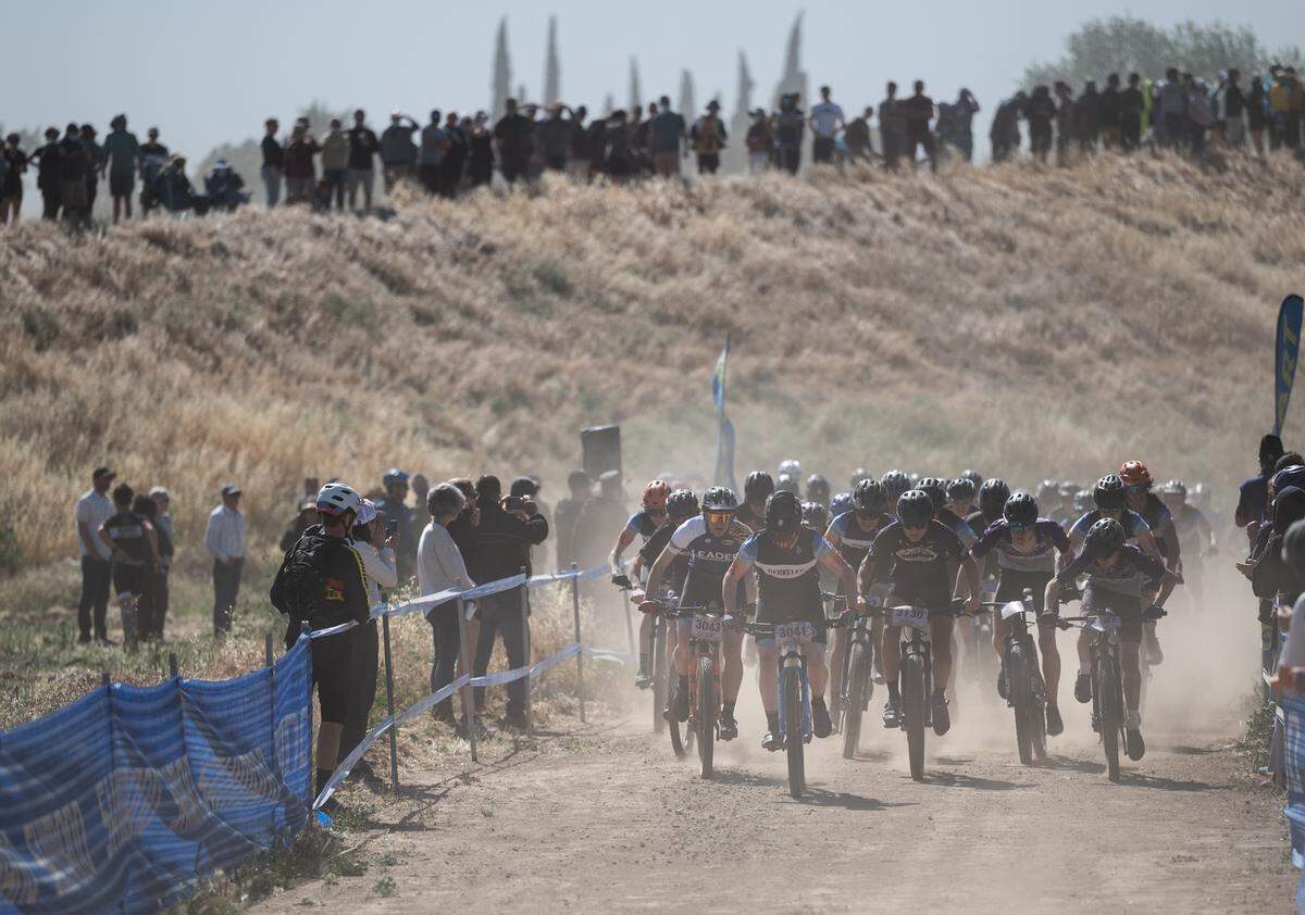 Riders from the boys sophomore division I race start the 10-mile mountain bike race at Tuolumne River Regional Park during the NorCal Interscholastic Cycling League event in Modesto, Calif., on Saturday, April 9, 2022.