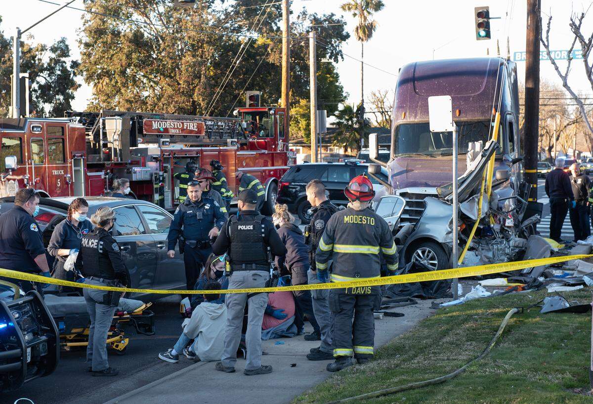 Modesto firefighters and police respond to a fatal accident Briggsmore Avenue and Carver Road in Modesto, Calif., on Tuesday, Feb. 1, 2022.