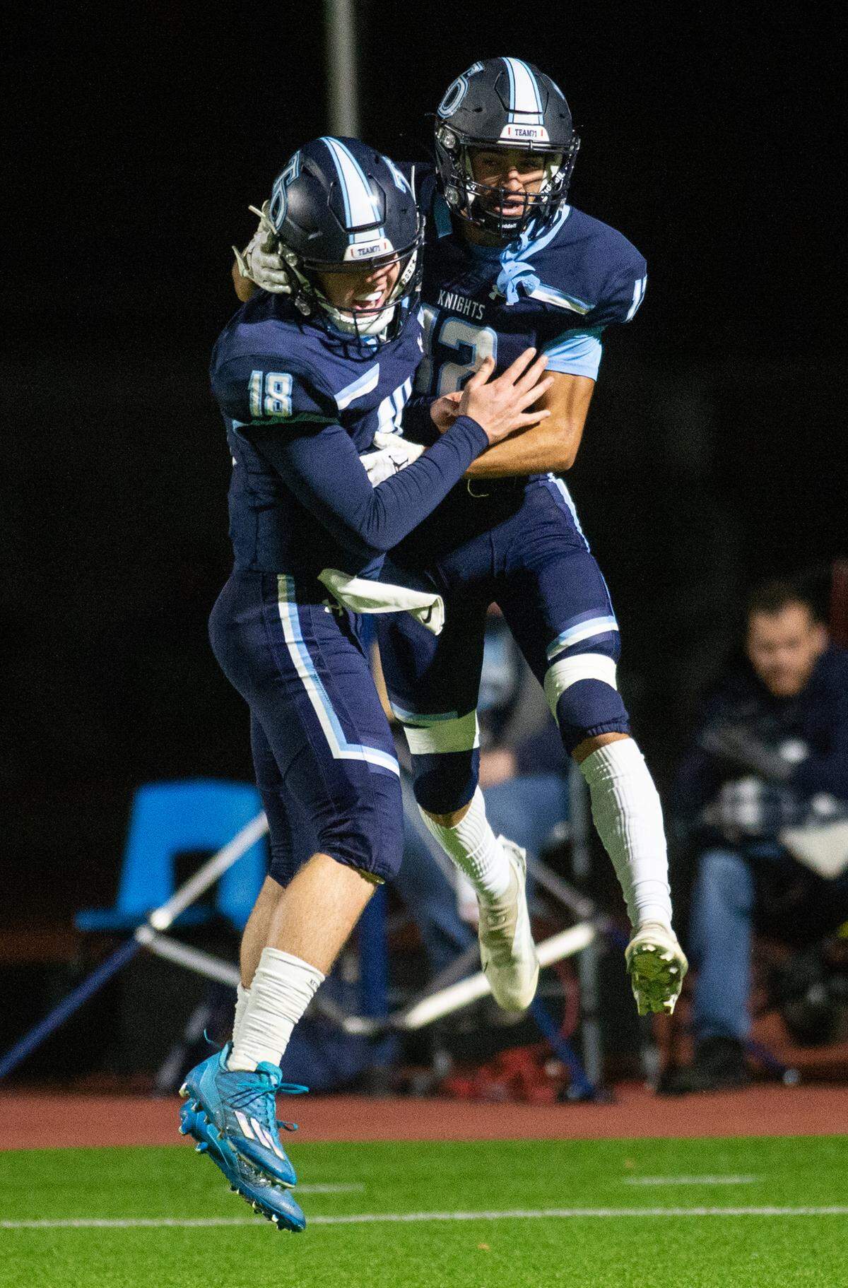Downey’s Conner Stoddard and Gabe Hernandez celebrate a touchdown during the CIF Sac-Joaquin Section Division II playoff game with Granite Bay at Downey High School in Modesto, Calif., Friday, Nov.11, 2022.