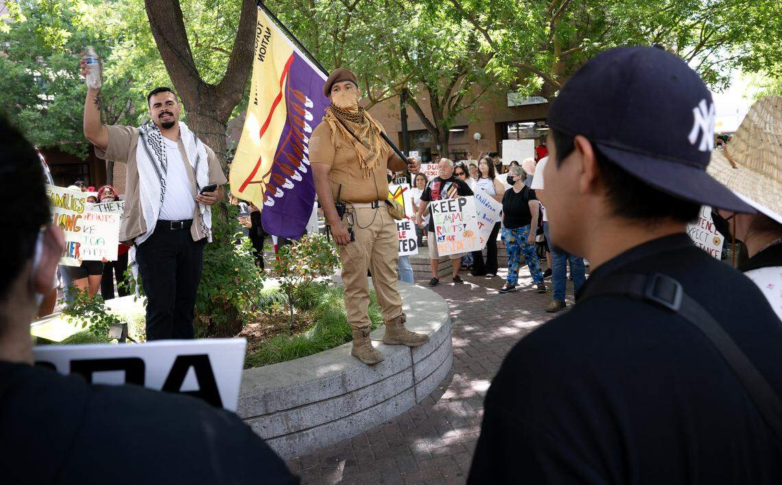 Efren Diaz of CVBIPOCC, left, speaks as protestors gathered at 10th Street Place to oppose Trump Administration policies in Modesto, Saturday, June 14, 2025. The rally was organized by the Central Valley Black Indigenous People of Color Coalition. Eli Coleman, a member of the Tohono O’odham tribe of the Sonoran Desert is at right.