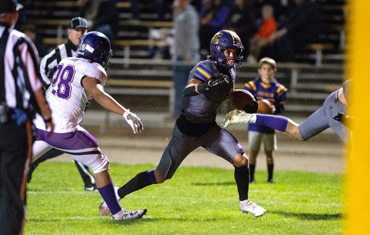 Escalon’s Logan Anderson runs in for a touchdown during the first round playoff game with Pacheco in Escalon, Calif., Friday, Nov. 4, 2022. Escalon won the game 55-0.