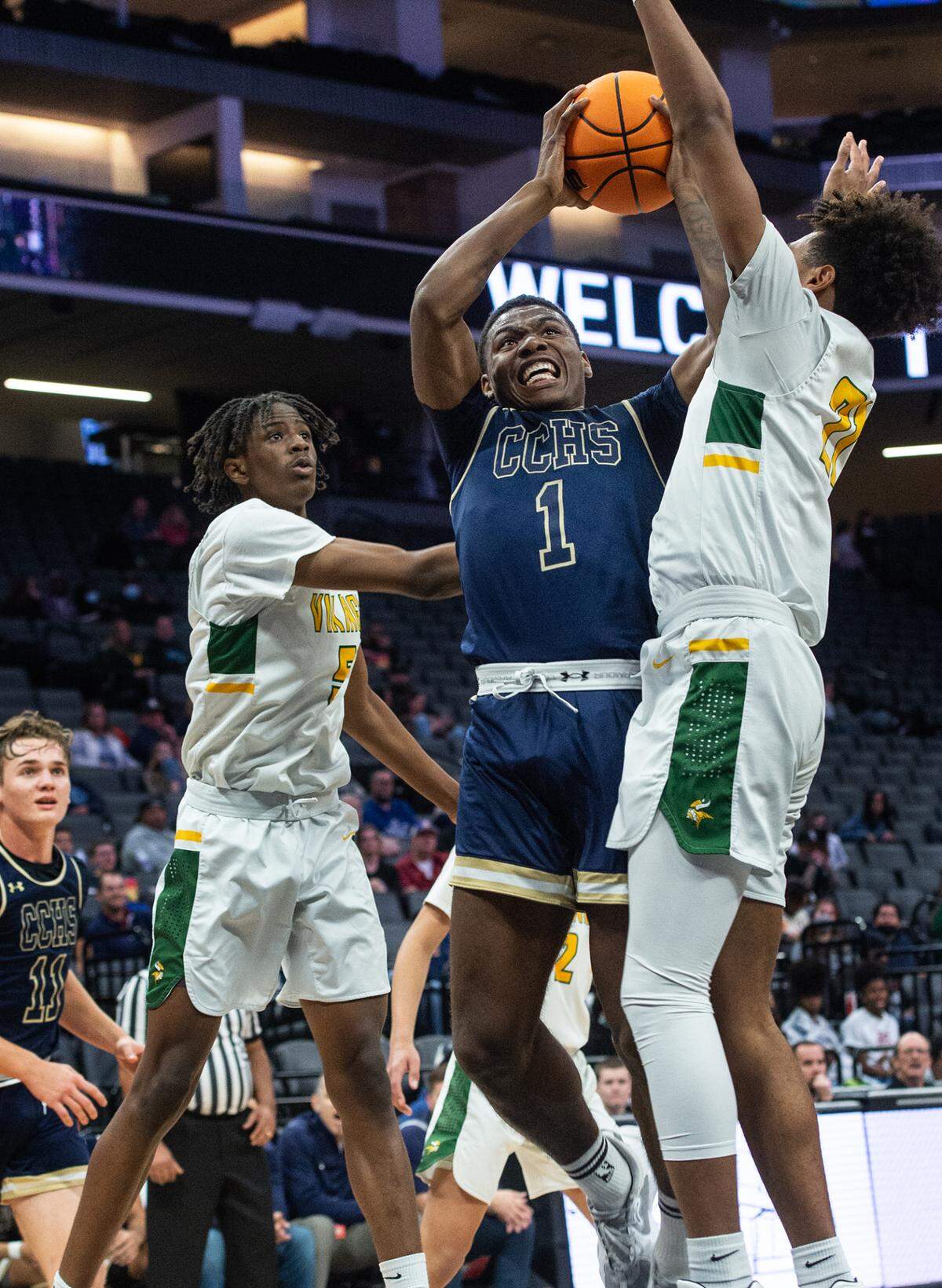 Central Catholic’s Malachi Miller attempts a shot over Vanden’s Antoine Thaxton during the boys Sac-Joaquin Section Division 3 final at the Golden 1 Center in Sacramento, Calif., on Saturday, Feb. 26, 2022.