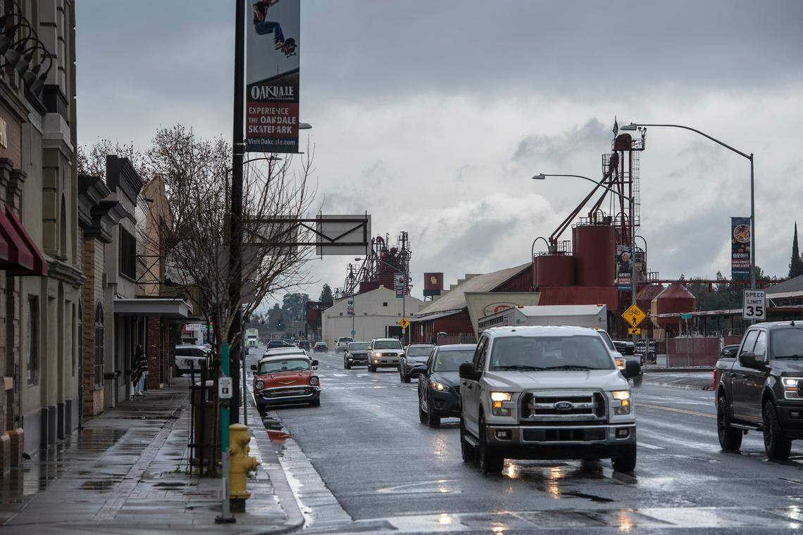 Rain and storm clouds roll through Oakdale, Calif., on Monday, Dec. 27, 2021.