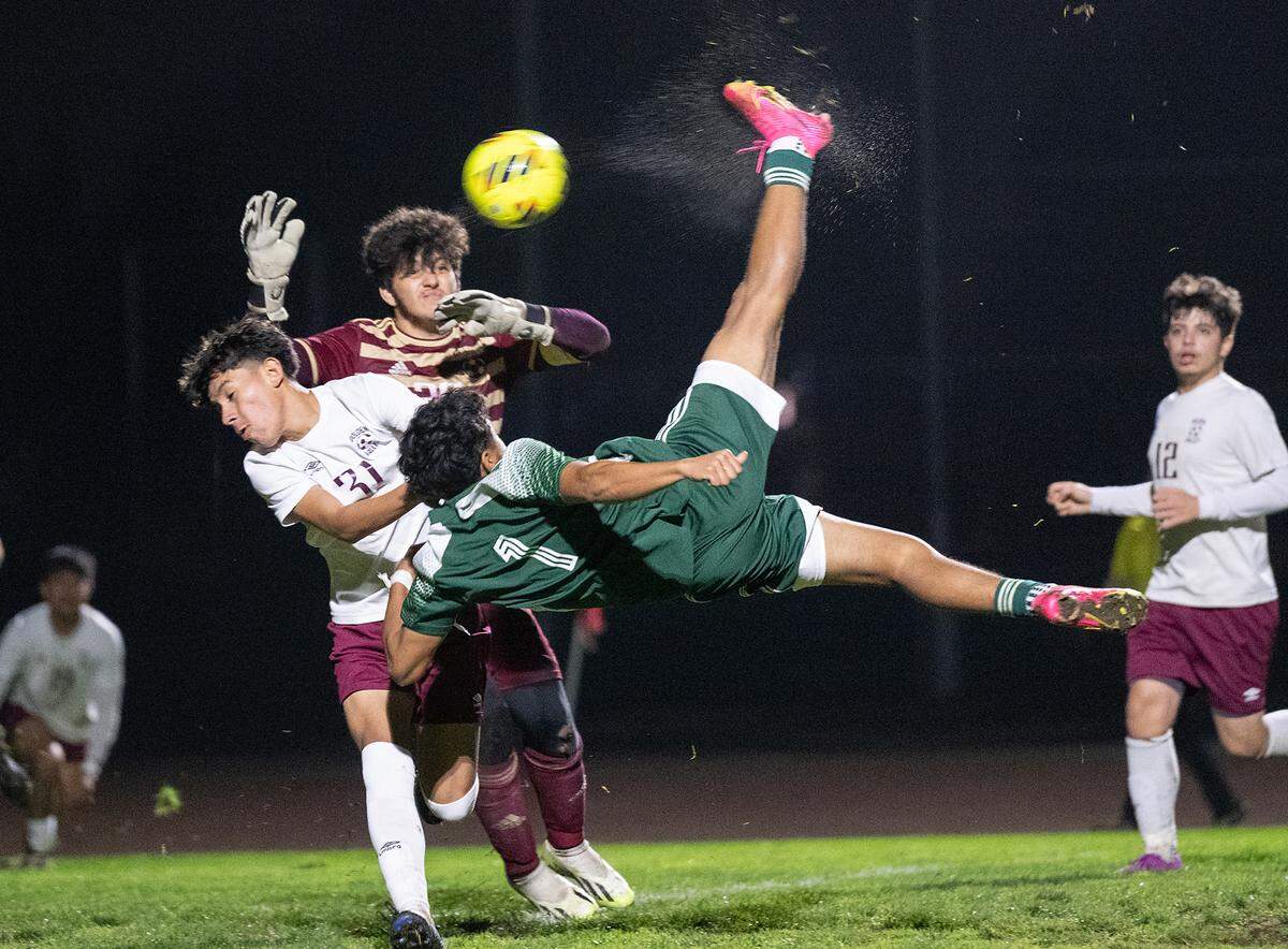 Central Valley’s Alexis Cervantes takes a shot on goal using a bicycle kick during the Central California Conference game with Golden Valley at Central Valley High School in Ceres, Calif., Tuesday, Jan. 16, 2024. Cervantes missed the shot wide but scored one goal in Central Valley’s 4-3 win.