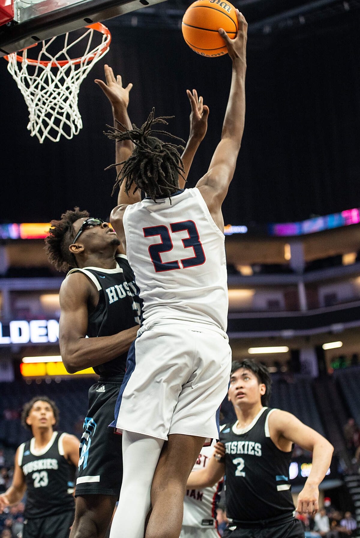 Modesto Christian’s Drevon Johnson attempts a reverse layup on Sheldon’s Marcellus Franklin during the Sac-Joaquin Section Division 1 boys basketball championship game at the Golden 1 Center in Sacramento, Calif., on Saturday, Feb. 26, 2022. Modesto Christian won the game 52-42.