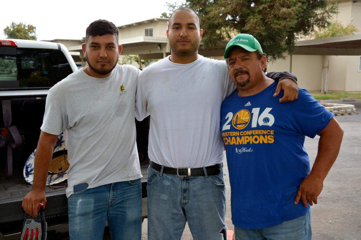 Tabco Enterprises landscaping workers (left to right) Jesus Garcia, Daniel Cabral, and Gildardo Espinoza helped to alert people in the Casa de Paz apartment complex in north Modesto to a three-alarm fire Tuesday Aug. 17, 2022.
