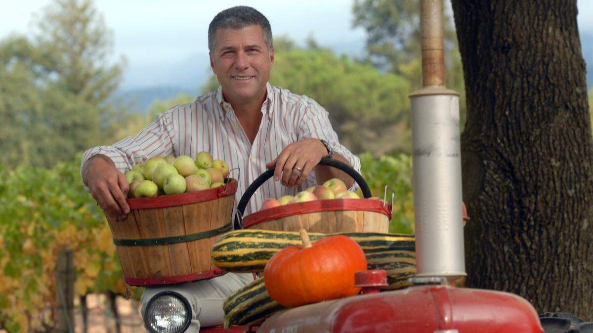 In this October 2008 photo, Tra Vigne restaurant founder chef Michael Chiarello sits on a tractor at Long Meadow Ranch Rutherford Gardens along the St. Helena Highway.