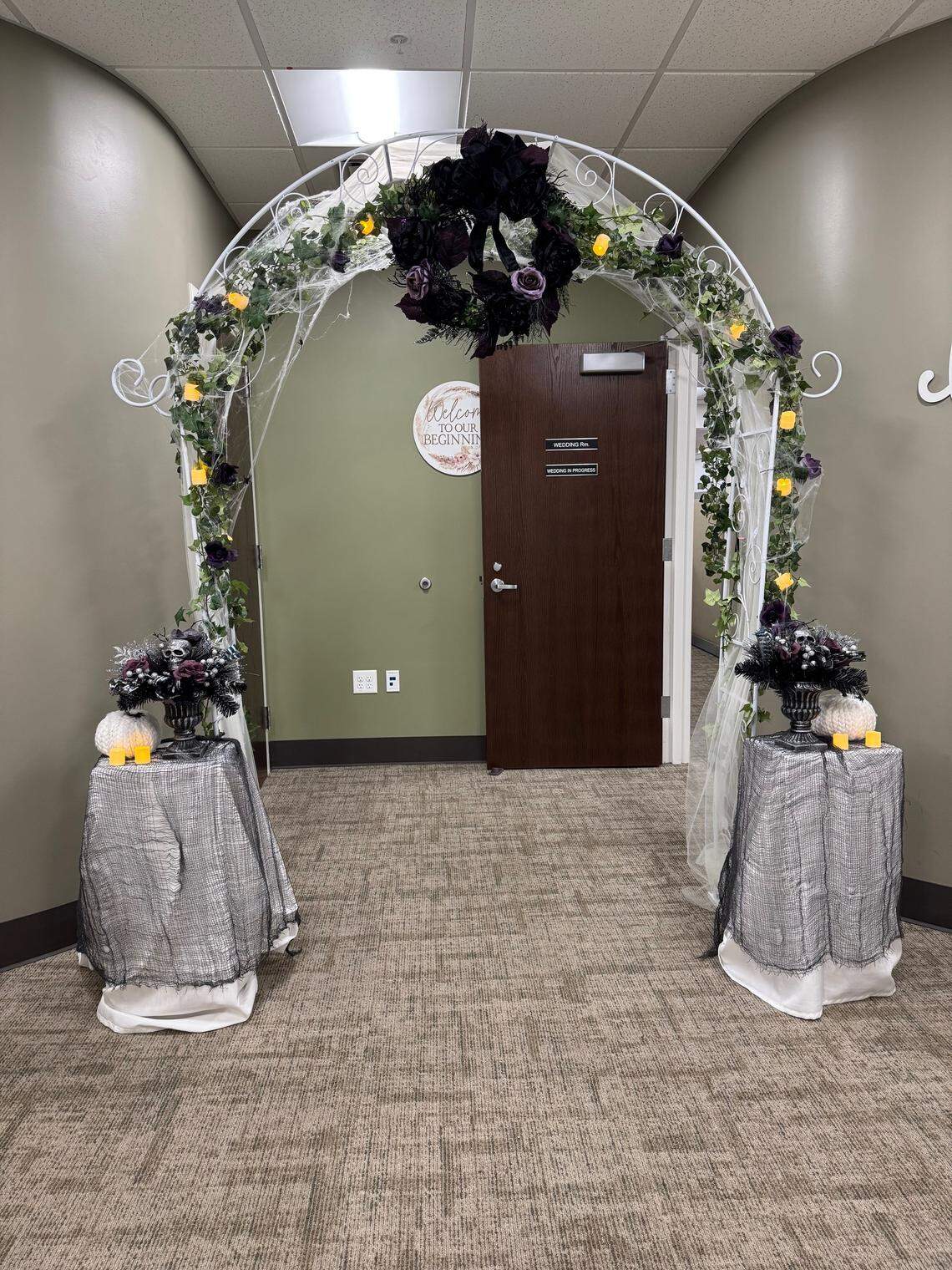 Halloween-themed arch is used during weddings ceremonies at the Clerk-Recorder’s office on Halloween in 2024.