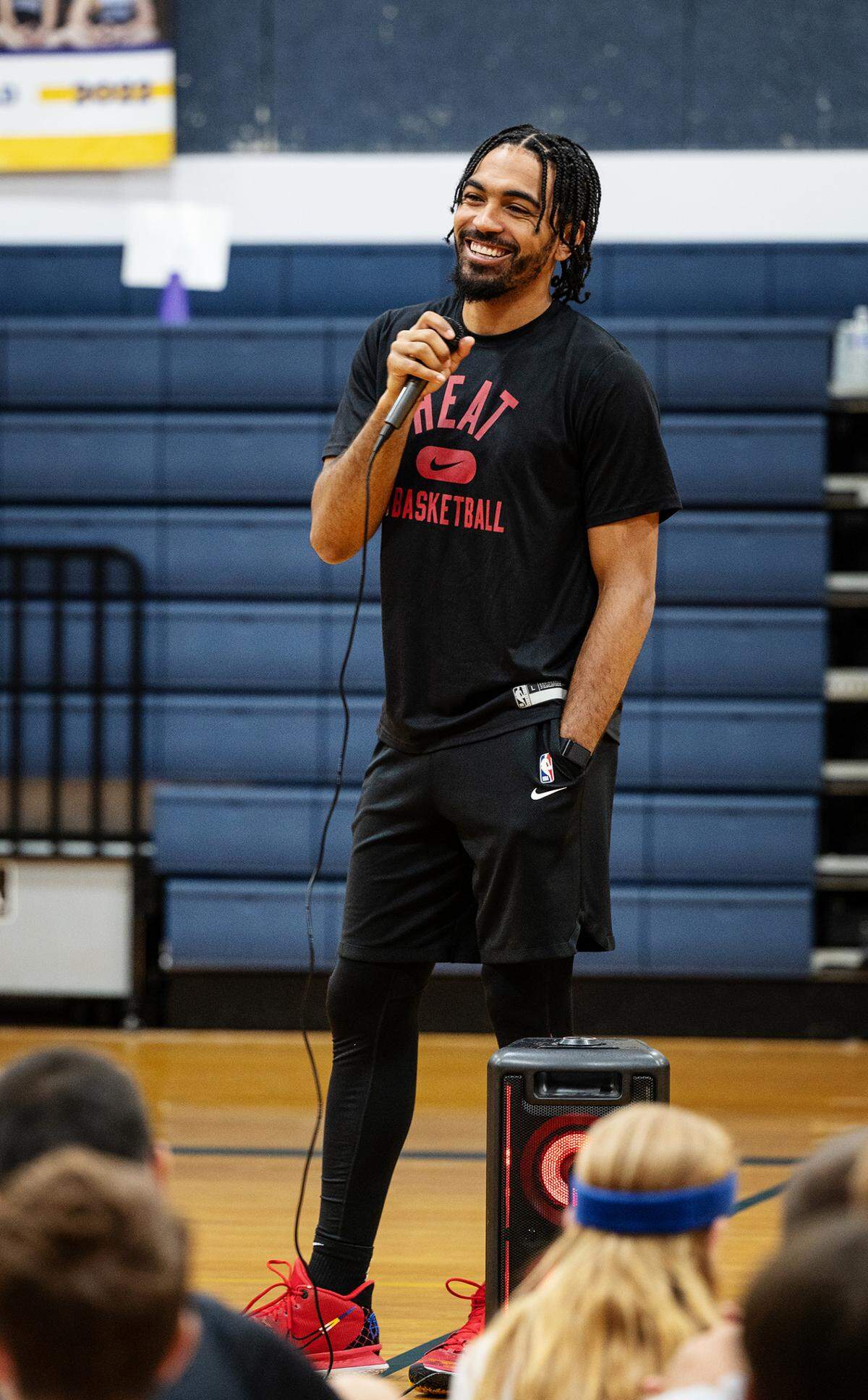 Modesto native and NBA player Gabe Vincent talks with young campers and parents during the Modesto Slam-N-Jam basketball camp at Big Valley Christian school in Modesto, Calif., on Tuesday, July 5, 2022.