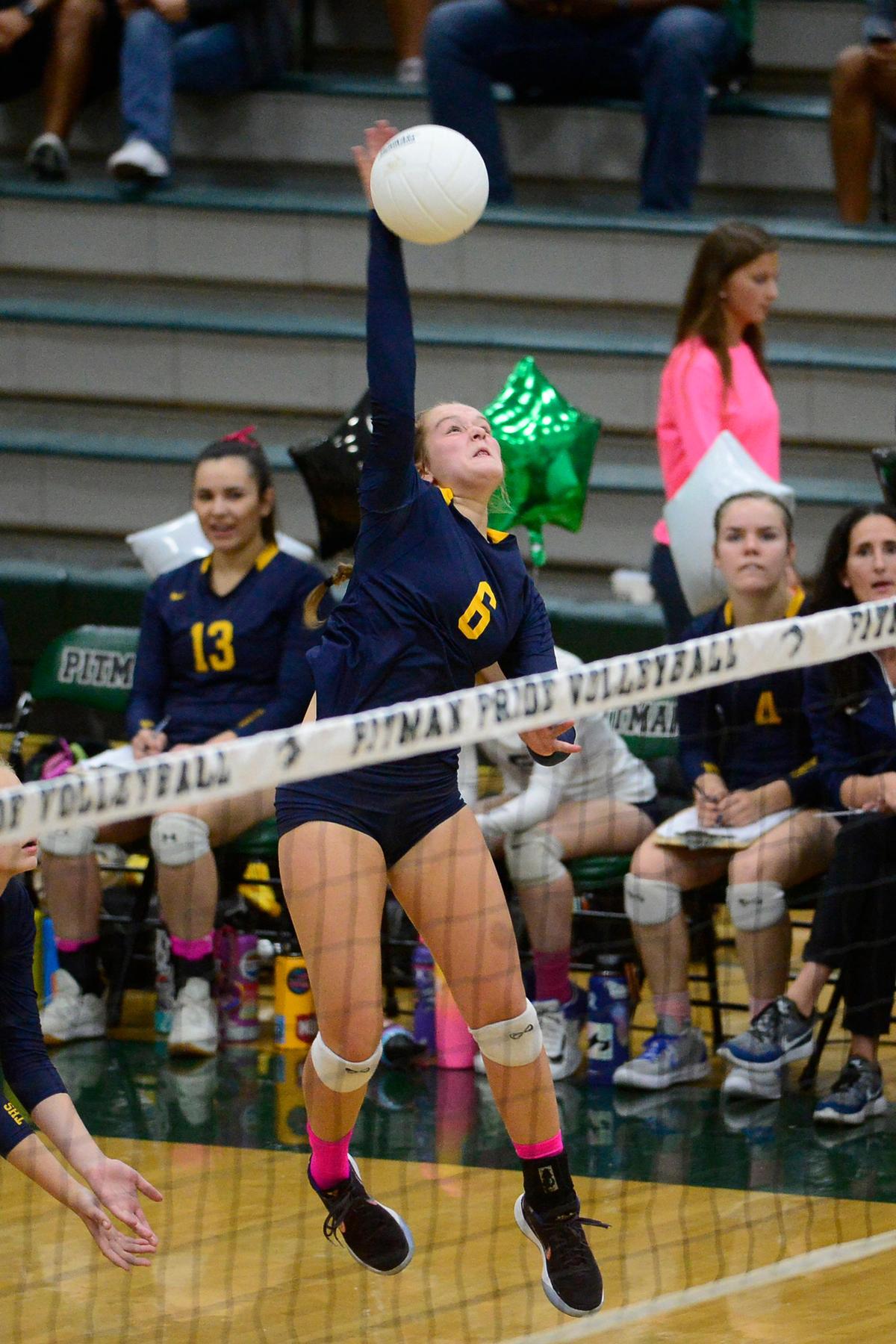 Turlock’s Ava Chiesa (6) spikes the ball, during the senior night, crosstown volleyball matchup of Turlock High at Pitman High, on Monday, Oct., 15 in Turlock, California.