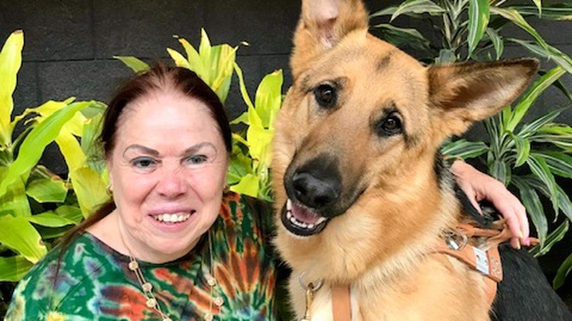 Sagi McCleary of Kansas City, Missouri, with her seeing-eye dog, Kristy. McCleary was raised in and near Modesto, Calif.
