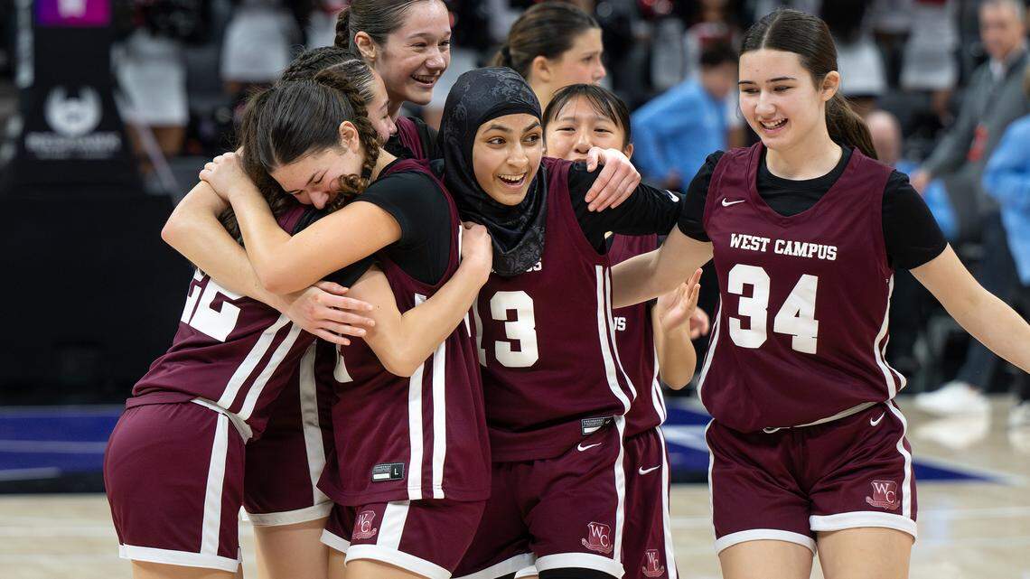 West Campus players celebrate thier 47-38 victory over Central Catholic in the Sac-Joaquin Section Division IV championship game at the Golden 1 Center in Sacramento on Friday.