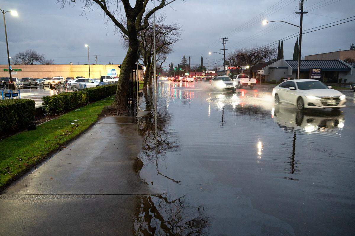 Street Flooding on Orangeburg Avenue near Coffee Road in Modesto, Calif., Tuesday, Dec. 27, 2022.