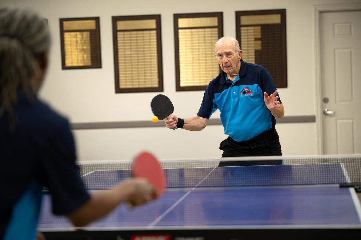 Mike Sturtevant plays a table tennis game with Gerald Moore during a meeting of the Modesto Table Tennis club in Hughson, Wednesday, Jan. 15, 2025.