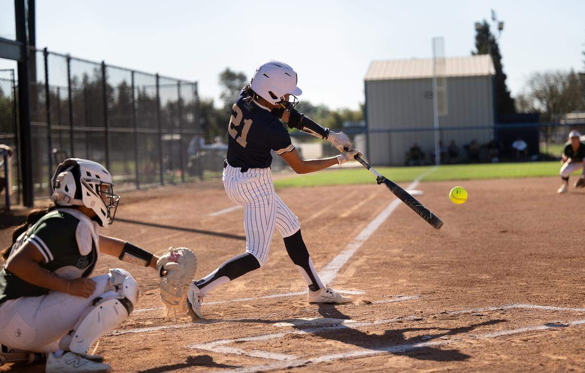 Central Catholic’s Ceriah Fitzhugh singles during the Valley Oak League game with Manteca at Central Catholic High School in Modesto, Tuesday, March 24, 2026.
