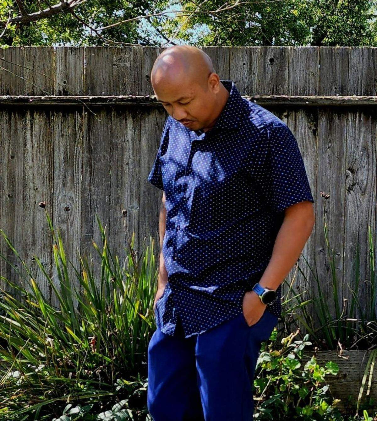 Sithy Bin, a former Modesto gang member, is pictured at the home of his fiancée in Southern California. He now helps former inmates like himself with housing, jobs and education, and mentors at-risk youth.