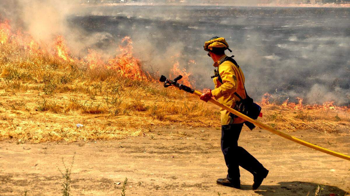 Crews contained a vegetation fire to 17 acres in Turlock on Thursday afternoon, May 22, 2025.