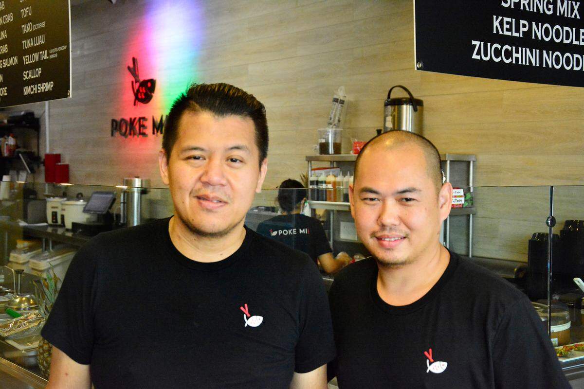 Tim Le (left) and Truong Nguyen, owners of the new McHenry Village restarant Poke Mi! in Modesto, Calif.