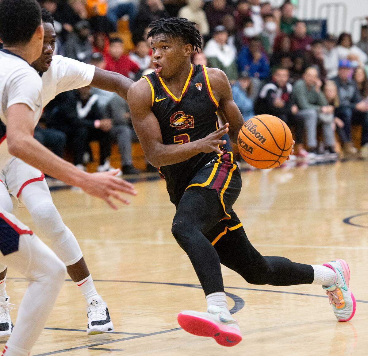 Clovis West’s Marshel Sanders scores on a drive to the basket during the Modesto Christian Holiday Hoop Classic championship game with Modesto Christian at Modesto Christian High School in Salida, Calif., Friday, Dec. 30, 2022.