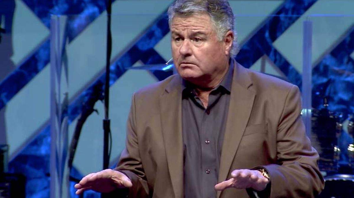 Les Hughey, former senior pastor at Highlands Church is pictured during a sermon at the church in Scottsdale, Arizona on December 17, 2017.