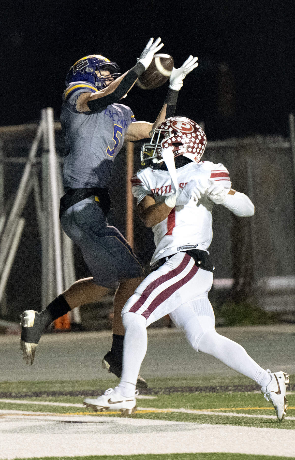 Escalon’s Sam Jimenez makes a touchdown catch over Patterson’s Jeremiah Lugo during the Sac-Joaquin Section Division IV championship game at St. Mary’s High School in Stockton, Calif., Friday, Nov. 24, 2023.