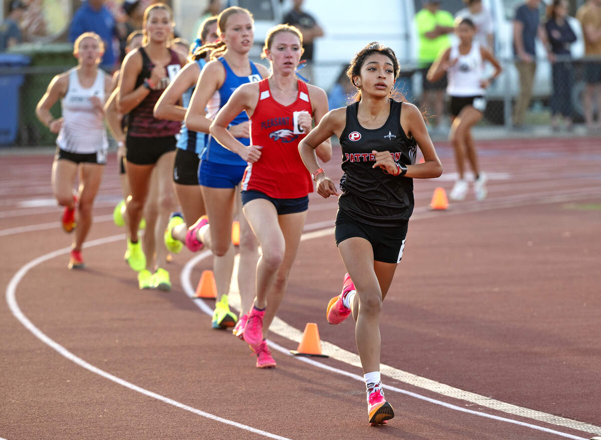 Patterson’s Natalie Arriaza pulls away from the pack in the girls 3200 meter race at the CIF Sac-Joaquin Section Masters Track Championship at Davis High School in Davis, Calif., Saturday, May 18, 2024. Arriaza won race 10:50.38.