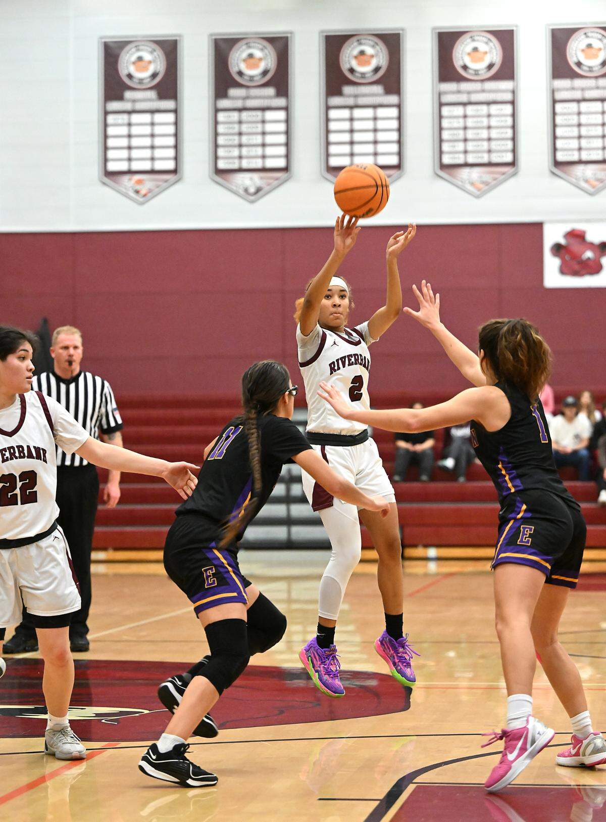 Riverbank’s Taylor Macias shoots a three point shot during the Trans Valley League game with Escalon at Riverbank High School in Riverbank, Calif.,Thursday, Jan. 4, 2024.