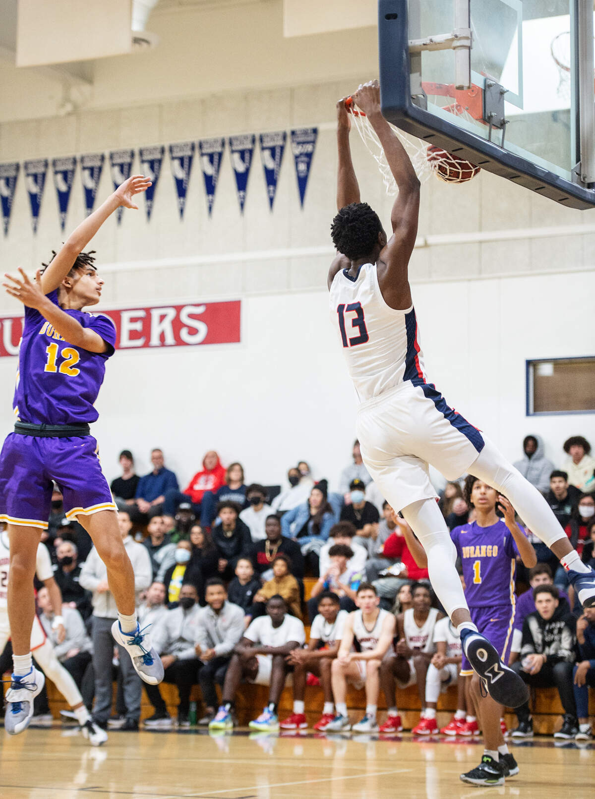 Modesto Christian’s Prince Oseya dunks for two during the Holiday Hoops Classic championship game with Durango NV in Salida, Calif., on Thursday, Dec. 30, 2021.