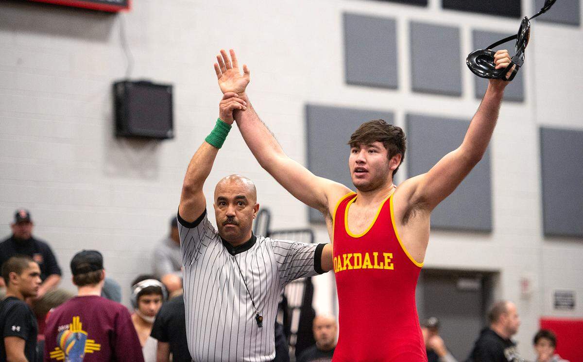 Oakdale’s Carlos Garcia won his 180 lb. in the Division 1 Sac-Joaquin Section team duals wrestling championship match with Vacaville at Lincoln High School in Stockton, Calif., Saturday, Jan. 28, 2023. Oakdale won the championship 40-25.