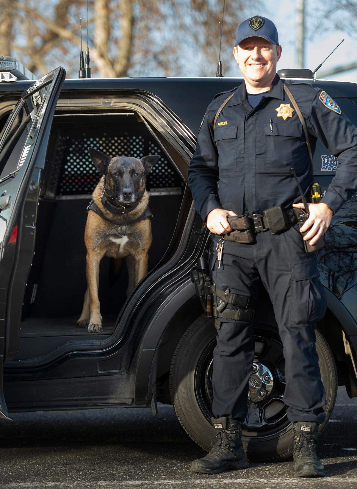 California Highway Patrol K9 officer, Pakito, 9, is retiring as the most senior CHP dog in the state both in terms of years of service and age. Photographed with his partner Matthew Fowles at the CHP office in Salida, Calif., on Tuesday, Dec. 28, 2021.