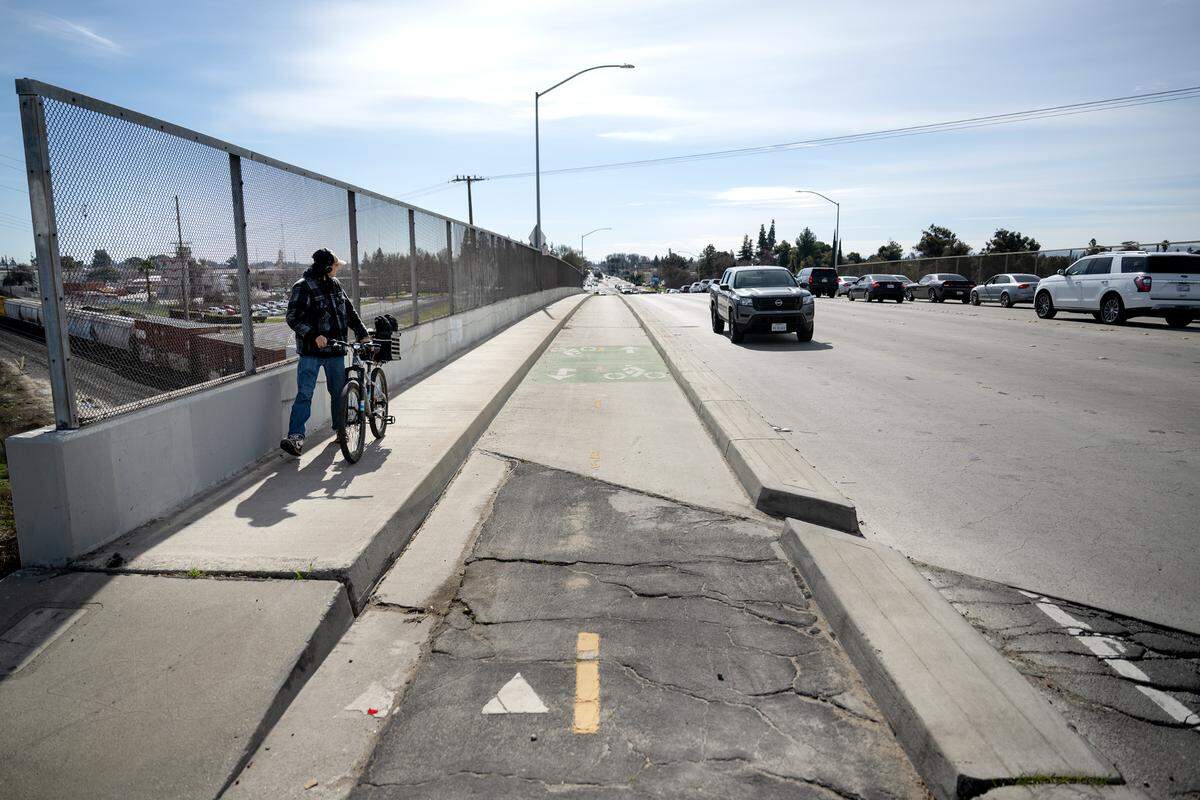 A dedicated bike lane on the Carpenter Road bridge crossing the railroad tracks at 9th Street in Modesto, Tuesday, Feb. 11, 2025.